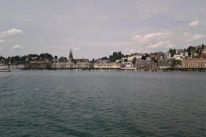 Lucerne small group walking tour and Lake Cruise from Zürich - Riverside squares and photo moments: Kornmarkt and Hotel des Balances