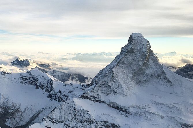 Matterhorn helicopter tour - longest scenic flight from Bern over the Swiss Alps - A closer look at the biggest glacier and why colors matter