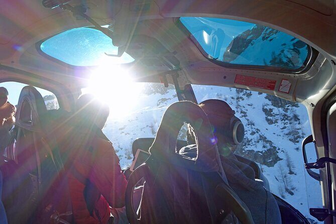 Private helicopter flight to Stockhorn mountain, with view to the Swiss Alps - Niesen and Wimmis: the triangular shadow idea