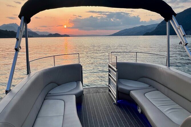 Private Sightseeing Boat Trip on Lake Thun, Interlaken - The one-hour itinerary: Schloss Spiez, Merligen, then sunset