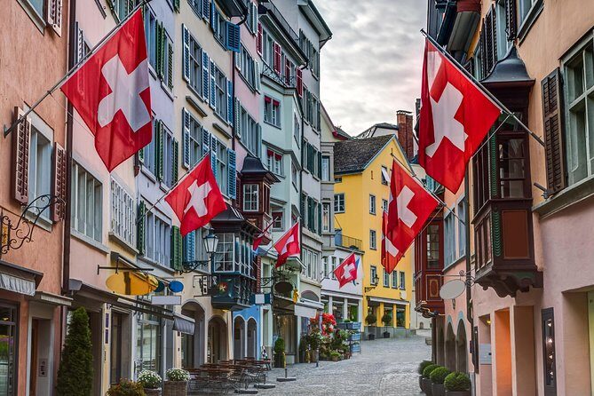 Private Tour of Zurich in 60 minutes with a Local - Old town lanes with pastel shutters and fluttering flags