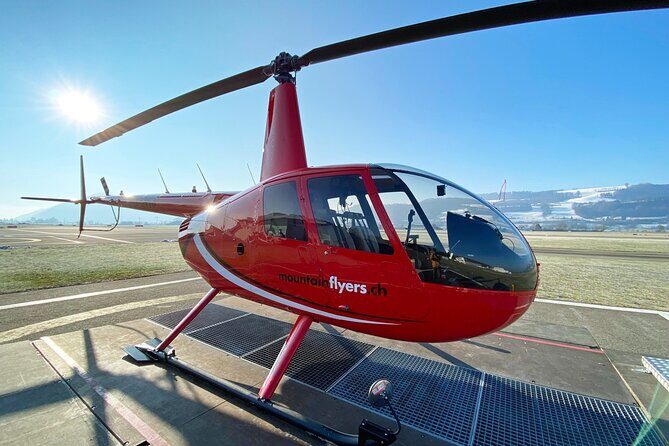 Swiss Capital city helicopter sightseeing tour - the ideal flight to see Berne - YB stadium, solar collectors, and the Big YB logo