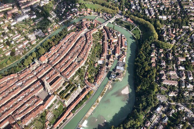 Swiss Capital city helicopter sightseeing tour - the ideal flight to see Berne - Paul Klee Centrum from above: the wave-form building
