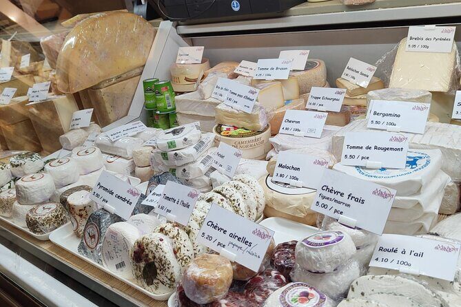 Taste Lausanne – A Full Swiss Food Tour by Do Eat Better - Stop 4: Eglise Saint-Laurent and the Carac Pastry with Green Icing